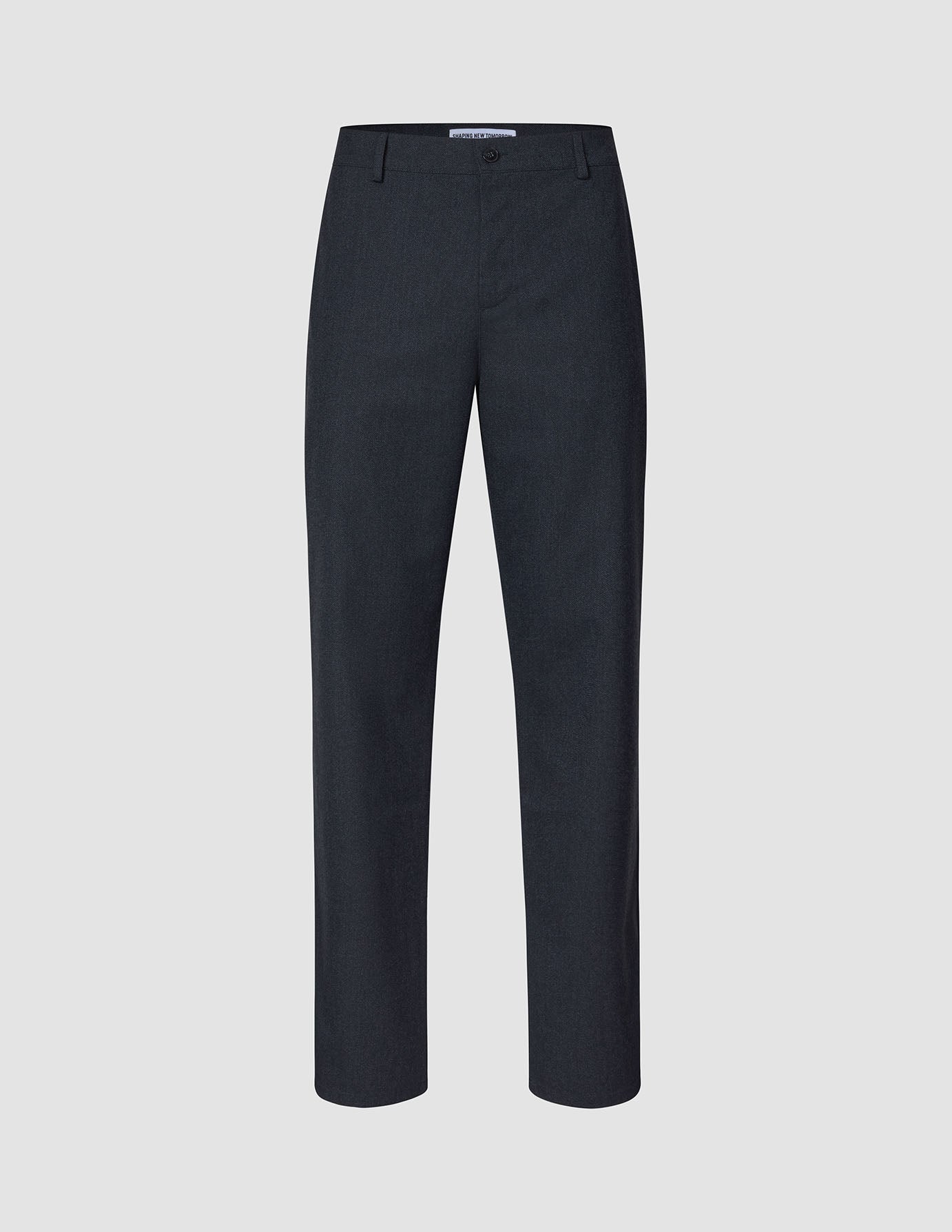 Mørkeblå Atelier-bukser i afslappet pasform, fremstillet i brudt twill med knaplukning og bæltestropper.